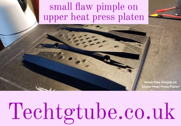 small flaw pimple on upper heat press platen